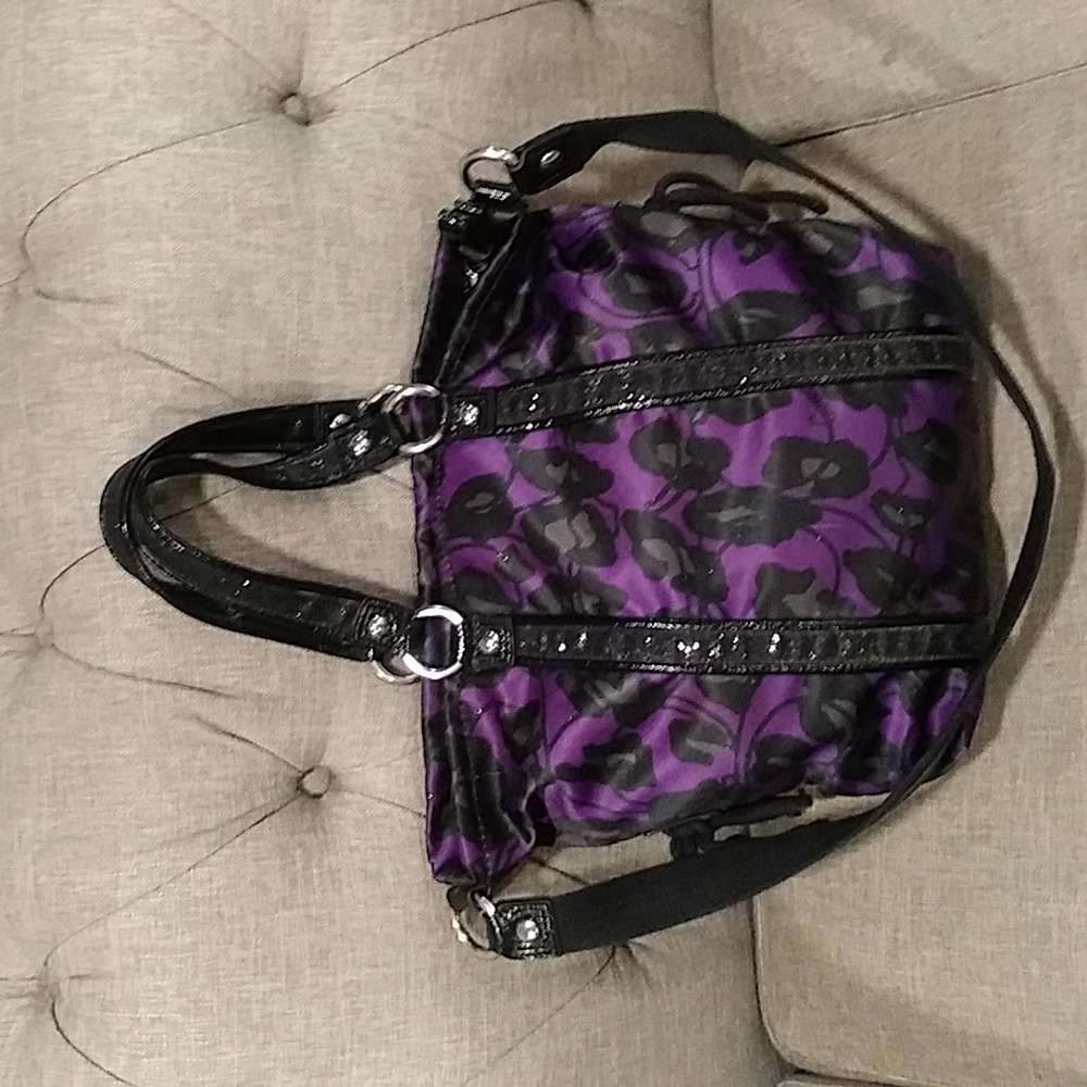 Rare coach Daisy ocelot woman's purple handbag